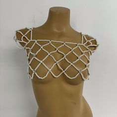 Handmade Silver Beaded Top Pearl Bralette, Bridal Body Jewelry, Rave Party Costume, Pearl Bra Body Chain, Mermaid Bra Top, Body Jewelry Size: Adjustable (special sizes require customization) Please contact customer service ❤ "Pearl Body Chain: The Elegant Companion Close to Your Body" 1：The pearl body chain is a brilliant embellishment on your skin. 2：Each pearl shines with a gentle luster, linked together to outline the charming lines. 3：It is the fashionable spirit, dancing on your collarbone Pearl Body Chain For Party, Bohemian Beaded Body Chain For Party, Pearl Beaded Body Jewelry For Party, White Beaded Pearl Body Jewelry, White Body Jewelry For Festivals, Party Body Jewelry With Beaded Chain, Mermaid Bra Top, Bridal Body Jewelry, Pearl Bra