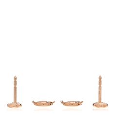 three pieces of jewelry sitting on top of each other in front of a white background