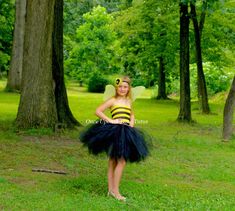 Bumble Bee Tutu Dress This gorgeous dress is made from a striped black and yellow unlined crochet top and black tulle, which is perfect for Halloween costumes, pageants, birthdays and more! Wings and headband are included! Great for baby showers, photo props, portraits, special occasions, and birthdays! Sizes: Length noted is length of skirt portion only. All tops are approximately 8 inches long. 12M - 2T 8 Inches long 3T - 4T 10 inches long 5 - 6 12 Inches Long 7-8 14 Inches Long Costume will b Birthday Dress Kids, Bumblebee Birthday, Kids Tutu Dress, Etsy Halloween, Kids Tutu, Toddler Tutu, Girls Costumes, Birthday Girl Dress, Black Tulle