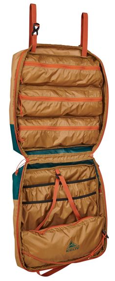 an open suitcase with multiple compartments on the front and back, in tan and orange