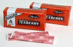 two packets of teaberry gum sitting next to each other