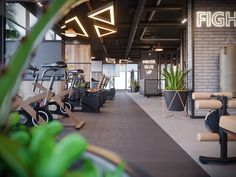 an indoor gym with rows of exercise bikes