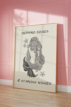 a mermaid kisses 8 starfish wishes sign in front of a pink wall with the words mermaid kisses on it