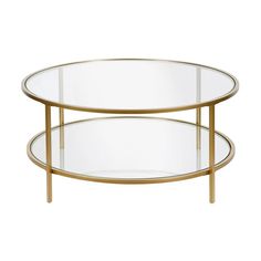 two round glass tables with metal legs and gold trimmings on each end, one is