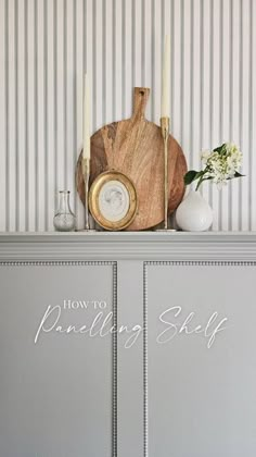 a wooden cutting board sitting on top of a dresser