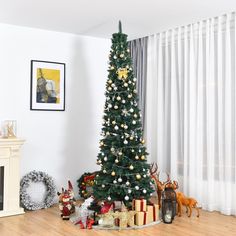 a decorated christmas tree in the corner of a living room with presents on the floor