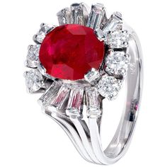 Luxury Oval Ruby Diamond Ring, Luxury Ruby And Diamond Oval Cabochon Ring, Luxury Ruby Ring With Diamond Accents And Round Shape, Luxury Ruby Ring With Oval Cabochon Diamond, Luxury Round Ruby Ring With Diamond Accents, Luxury Ruby Gemstone Ring In Platinum, Oval Cabochon Ruby And Diamond Ring, Oval Cabochon Ruby Ring With Diamonds, Luxury Ruby Ring With Platinum Center Stone