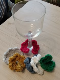 CROCHETED WINE GLASS MARKERS, GREAT FOR A PARTY These cute wine glass markers are crocheted in acrylic yarn and sit on the bottom of a stem glass to mark your drink. The set includes 6 crocheted cuffs n red, green, blue, white, gold, and silver. The cuffs curl and sit on the bottom of a stem glass. These are great for parties so guests can keep track of their drinks. Super good for your holiday entertaining! All items made in a smoke free environment. Priority shipping available at an additional Glass Markers, Wine Glass Markers, Crochet Gift, Wine Charms, Holiday Entertaining, Crochet Gifts, Acrylic Yarn, Gold And Silver, Wine Glasses