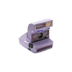 a purple polaroid camera sitting on top of a white surface