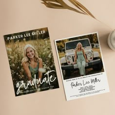 two graduation announcement cards sitting on top of a table