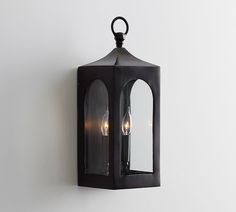 an outdoor wall light with two lights on it