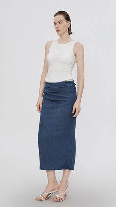 Fabric 69% Lyocell 23% Polyester 8% Viscose Thickness Thin Fit Type Regular Stretch Fabric Slight Stretch Tips : Wash with like colors use mild detergent do not soak do not pull hard SPU : UWG840199 Denim Skirt