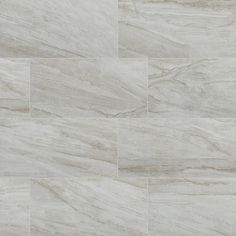 a white marble tile floor with squares