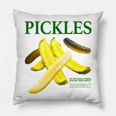 a white pillow with pickles on it and the words pickles written in green