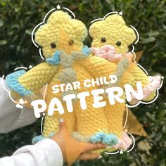 two crocheted teddy bears holding each other with the words star child written above them