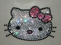 an image of a hello kitty made out of sequins