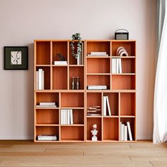 an empty bookcase with many books in it