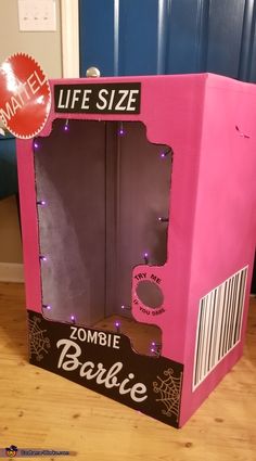 a cardboard box that is shaped like a zombie barbie