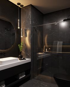 a bathroom with a sink, mirror and shower stall in black marbled finish on the walls