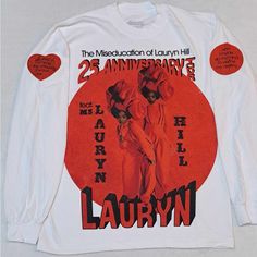 a white long sleeved shirt with an image of two dancers on the front and back