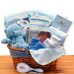 a basket filled with baby items on top of a table