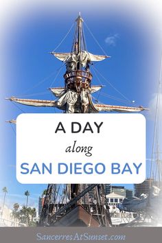 a sign that says a day along san diego bay on the front of a ship