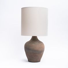 Vintage clay pot in earthen, unglazed rice wine bottle table lamp from Addison West home goods on a white background Book Furniture, Wine Bottle Lamp, Cordless Lamps, Ceramic Artwork, Outdoor Candles, Jar Storage, Mini Lamp, Bottle Lamp, Furniture Side Tables