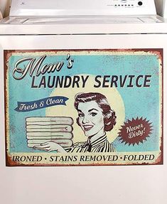 there is a sign on the front of a washing machine that says moo's laundry service