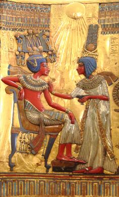 an egyptian painting with two women shaking hands