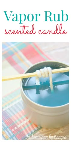 a toothbrush in a cup with the words vapor rub scented candle