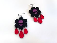 Purple mirror skull on black daisy flower, red mirror blood drips, acrylic earrings. Back side of red mirror is grey. Front of black daisy is frosted/matte and the back is glossy. Please note: for the month of October, any earrings with a Halloween theme (ie: bats, ghosts etc) will be shipped in a custom Halloween themed box! This year's box is bright orange. If you would prefer the kraft brown style box instead, just message me after placing the order. Thanks! 🎃 Drop length of 2.75 inches. Cho Blood Drip, Purple Mirror, Black Daisy, Red Mirror, Flower Red, Style Box, Earrings Purple, Brown Style, Halloween Theme