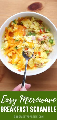 a person holding a spoon over a bowl of food with the words easy microwave breakfast scramble on it