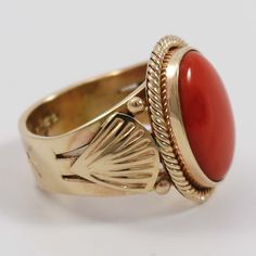 14k Gold Ring with Hand-Stamped and Twisted Wire Design and set with Coral.Ring Size: 7.5.5” Setting Width, .75” Setting Height.25” Band Width Cocktail Earrings, Wire Design, Coral Ring, Coral And Gold, Twisted Wire, Krishna Images, 14k Gold Ring, Lord Krishna, Emerald Ring