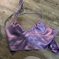 Purple Satin Top. Never Worn Purple Satin Top For Spring, Spring Purple Satin Top, Spring Purple Party Crop Top, Purple Satin Party Top, Fitted Purple Halter Top, Chic Purple Crop Top For Party, Spring Satin Stretch Halter Top, Spring Satin Halter Top, Spring Party Purple Halter Top