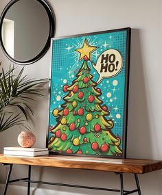 a christmas tree on a table with a speech bubble above it that says hoo