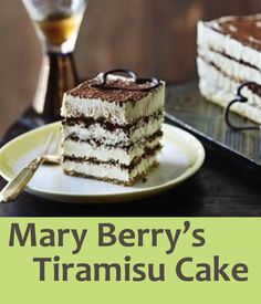 a slice of mary berry's tramisiu cake on a plate with a fork