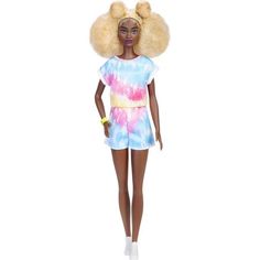 a barbie doll with blonde hair wearing a tie dye dress