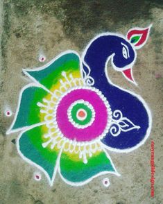 a colorful peacock painted on the ground