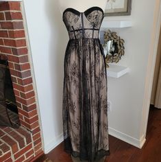 This Stunning Black Lace Bustier Strapless Maxi Dress From Lulus Is Perfect For Any Formal Or Party Occasion. The Dress Features A Solid Pattern And Is Made Of Polyester Material, Making It Easy To Care For And Machine Washable. The Dress Has A Zip Closure And Strapless Sleeve Type, Adding To Its Elegance And Style. The Dress Is Available In Size Small And Is Suitable For All Seasons, Including Winter, Summer, Fall, And Spring. Its Beautiful Lace Fabric Type And Long Dress Length Make It A Perfe Witchy Cocktail Dress, Black Lace Bustier, Lace Bustier, Strapless Maxi, Strapless Maxi Dress, Pinterest Closet, Lulu Dresses, Solid Pattern, Lace Fabric