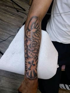 a person with a tattoo on their arm