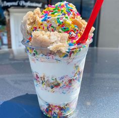 an ice cream sundae with sprinkles on top