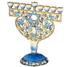 an ornate blue and gold menorah with seven candles