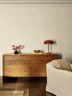 a living room scene with focus on the dresser