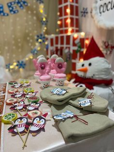 a table topped with lots of decorated items