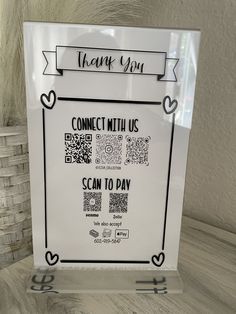 a sign that says, thank you connect with us scan to pay