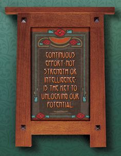 a wooden frame with a quote on it