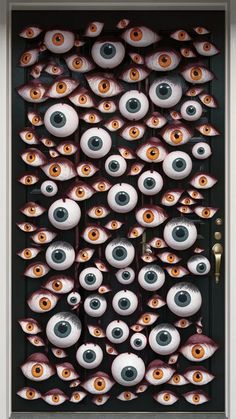 a door with many fake eyes on it