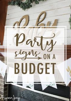 a sign that says party signs on a budget next to a fireplace with greenery