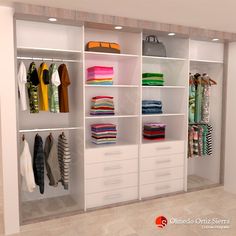 an open closet with clothes hanging on the shelves