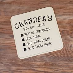 a sign that says grandpa's to - do list on a wooden table top